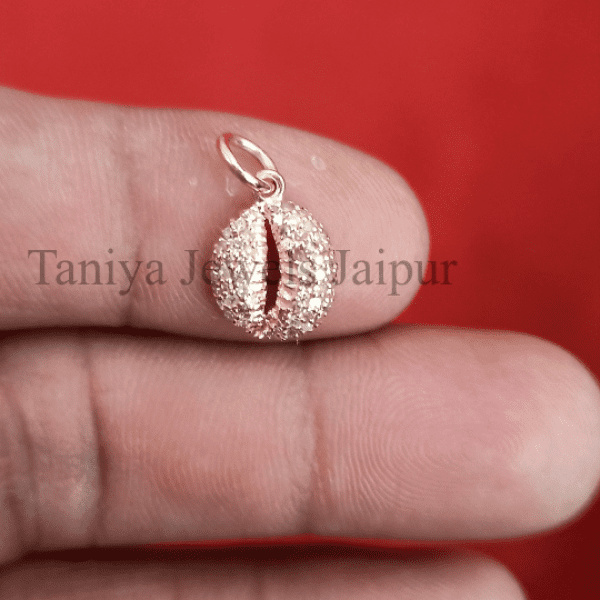 silver cowrie charms