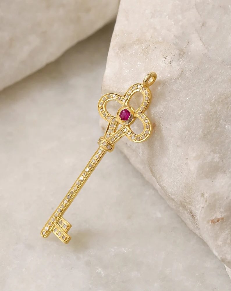 Bohemian key pendant charm pave diamond in sterling silver. Designer Gold plated super fine quality jewelry pendant.
